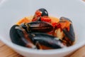 Tomato soup with mussels. The process of cooking tomato soup from mussels in a cooking class. Home-made food Royalty Free Stock Photo