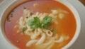 Tomato soup with pasta and parsley in white bowl, stock photo. Generative AI Royalty Free Stock Photo