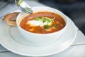 Tomato soup with seafood in a white plate Royalty Free Stock Photo