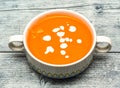tomato soup served in pot isolated on wooden table top view of indian spicy food Royalty Free Stock Photo