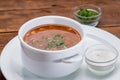 Tomato soup in a white bowl
