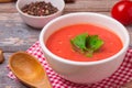 Tomato soup in a white bowl . Traditional red cold gazpacho soup with tomatoes. Spanish cusine Royalty Free Stock Photo