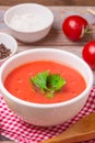 Tomato soup in a white bowl . Traditional red cold gazpacho soup with tomatoes. Spanish cusine Royalty Free Stock Photo