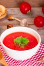 Tomato soup in a white bowl . Traditional red cold gazpacho soup with tomatoes. Spanish cusine Royalty Free Stock Photo