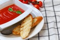 Tomato soup in a white plate Royalty Free Stock Photo