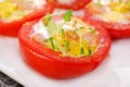 Tomato stuffed with quail egg Royalty Free Stock Photo