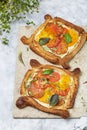 Tomato tart, puff pastry topped with ricotta and tomatoes