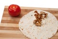 Tomato and tortilla with chicken meat preparing Royalty Free Stock Photo