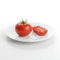 Tomato Vegetable Sliced Tomato on a Reflective Plate Royalty Free Stock Photo