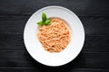 Tomato vegetarian spahgetti with cheese parmesan and basilic on