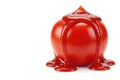 A tomato from which ketchup flows. Space for text. Royalty Free Stock Photo