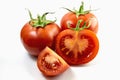 Tomato whole, half and slice, close-up view, macro photography, isolated on white background high quality details Royalty Free Stock Photo