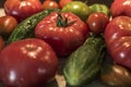 Tomatoe and cucumber wooden table bio organic backyard healthy outdoor produce germany macro closeup