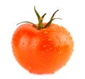 Tomatoe with water drops Royalty Free Stock Photo