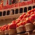 Tomatoes in baskets arranged on a wooden balcony against the backdrop of La Tomatina Festival.Generative AI