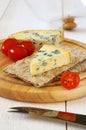 Tomatoes and blue cheese on crispbread Royalty Free Stock Photo