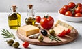 Tomatoes with cheese and bottles of butter on the table. Conceptual food photo Royalty Free Stock Photo