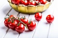 Tomatoes. Cherry tomatoes. Cocktail tomatoes. Fresh grape tomatoes carafe with olive oil Royalty Free Stock Photo