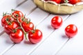 Tomatoes. Cherry tomatoes. Cocktail tomatoes. Fresh grape tomatoes carafe with olive oil Royalty Free Stock Photo