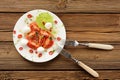 Tomatoes, chili pepper, mozarella and watercress salad in white