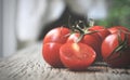 Tomatoes, cooked for the preservation on the old wooden table. Organic food, Cherry tomatoes on wood. Royalty Free Stock Photo