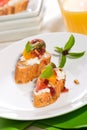 Tomatoes and cream cheese canapes Royalty Free Stock Photo