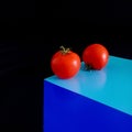 Tomatoes on the cube Royalty Free Stock Photo