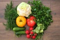 Tomatoes cucumbers cabbage radish dill and parsley on a table in the village Royalty Free Stock Photo