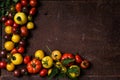 Tomatoes frame on a rusty background Royalty Free Stock Photo