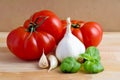 Tomatoes, garlic and basil Royalty Free Stock Photo