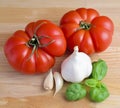 Tomatoes, garlic and basil Royalty Free Stock Photo