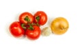 Tomatoes, garlic, onion on a white background. It is isolated. Royalty Free Stock Photo