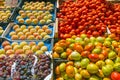 Tomatoes, grapes and peaches for sale