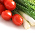 Tomatoes and green onions Royalty Free Stock Photo