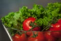 Tomatoes and Greens nutrition collage, Royalty Free Stock Photo