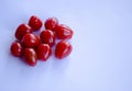 Tomatoes in group on white background Royalty Free Stock Photo
