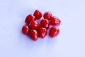 Tomatoes in group on white background Royalty Free Stock Photo
