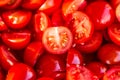 Tomatoes macro, red healthy vegetable sliced on wooden desk. Macro detail of red fresh tomato from garden. Royalty Free Stock Photo