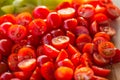 Tomatoes macro, red healthy vegetable sliced on wooden desk. Macro detail of red fresh tomato from garden. Royalty Free Stock Photo