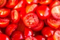 Tomatoes macro, red healthy vegetable sliced on wooden desk. Macro detail of red fresh tomato from garden. Royalty Free Stock Photo