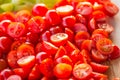 Tomatoes macro, red healthy vegetable sliced on wooden desk. Macro detail of red fresh tomato from garden. Royalty Free Stock Photo