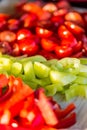 Tomatoes macro, red healthy vegetable sliced on wooden desk. Macro detail of red fresh tomato from garden. Royalty Free Stock Photo