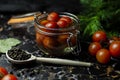 Tomatoes marinated in a glass jar Royalty Free Stock Photo