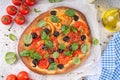 Tomatoes and olives homemade vegetable focaccia Royalty Free Stock Photo