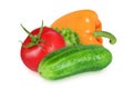 Tomatoes, peppers and cucumber on an isolated white background. Orange pepper, red tomatoes and cucumber Royalty Free Stock Photo