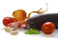 Tomatoes, peppers, garlic, eggplant, onions, carrots on a white isolated background Royalty Free Stock Photo