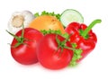 Tomatoes, peppers, garlic, onions and cucumbers on an isolated white background. Red pepper, red tomatoes, onion, garlic and cucum Royalty Free Stock Photo