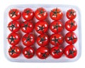 Tomatoes in a plastic container