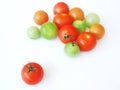 Tomatoes in red, green orange