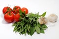 Tomatoes, sage leafs and garlic